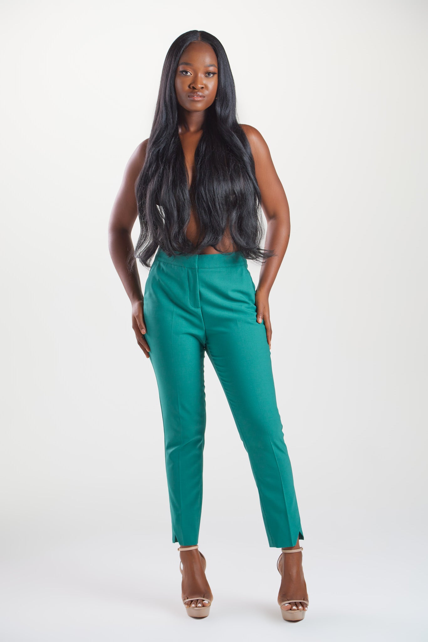 Women's pant suits with their distinctive ankle pyramid cut. Expertly crafted from Italian extra fine merino wool and elastane. Ideal for business meetings or casual wear.