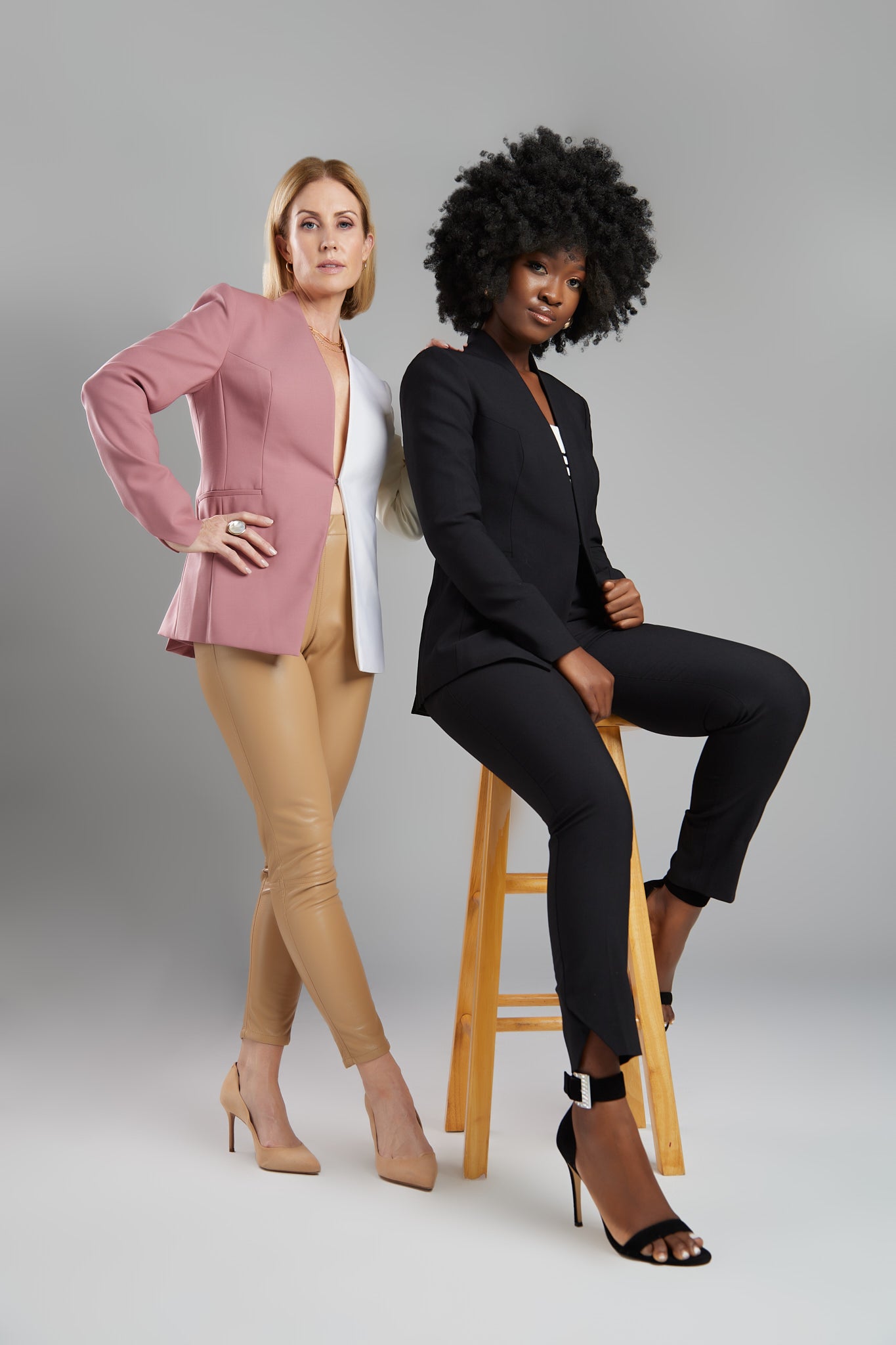 Seragyi's Nicole Blazer in Women's Suits, made from Italian Merino Wool. Features a cross-over collar and pyramid-cut sleeves, blending elegance and comfort in Women's Clothing.