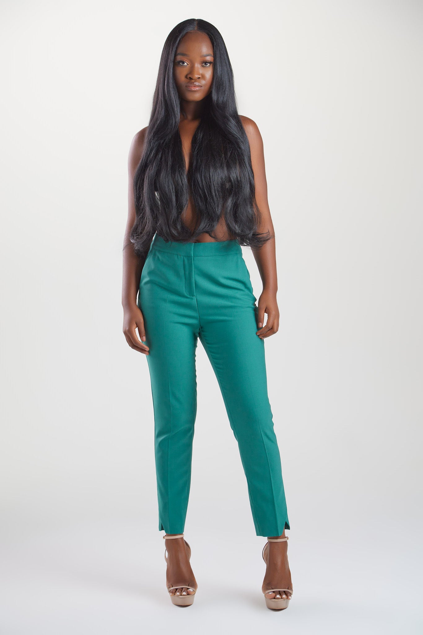 Women's pant suits with their distinctive ankle pyramid cut. Expertly crafted from Italian extra fine merino wool and elastane. Ideal for business meetings or casual wear.