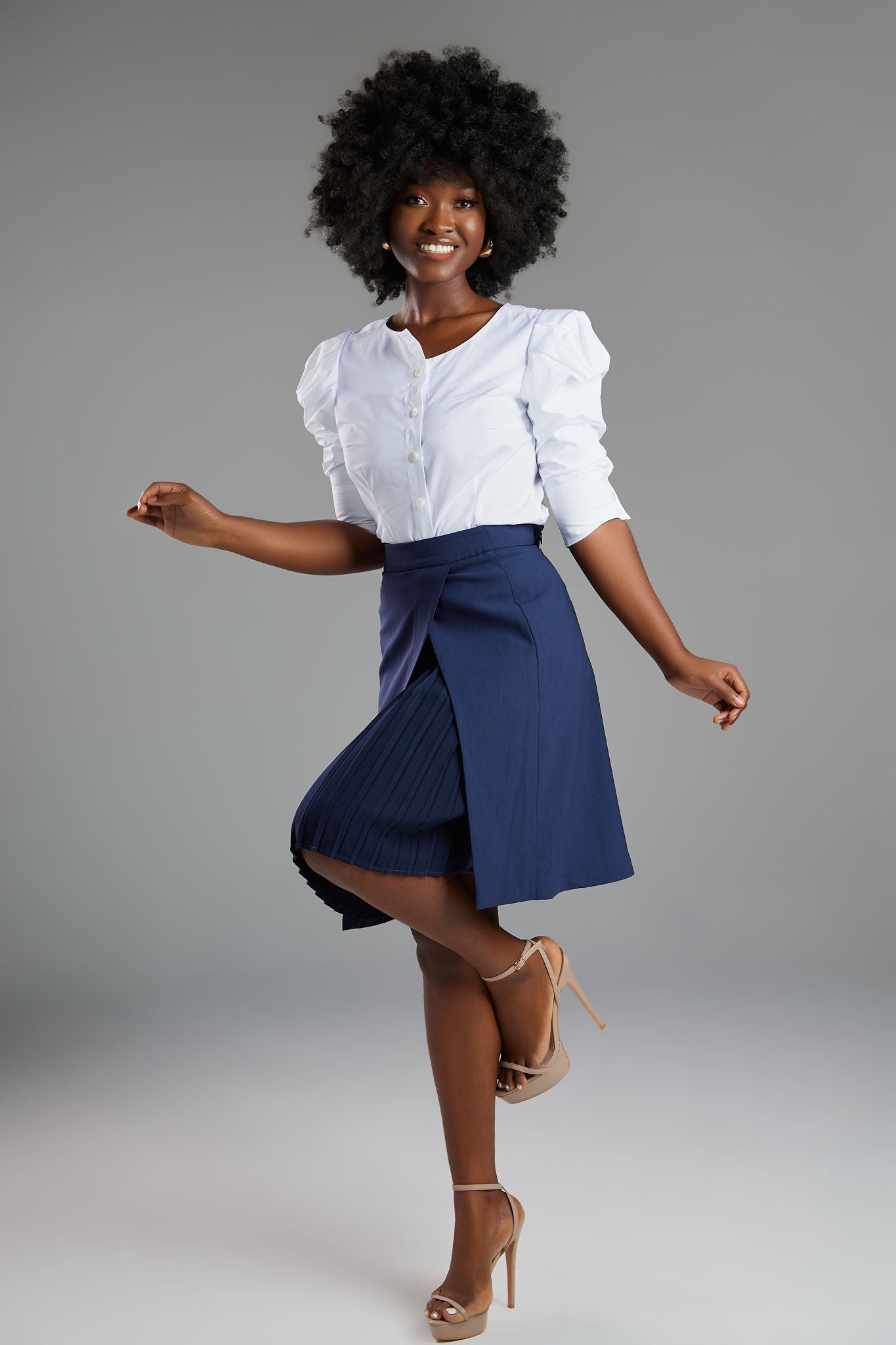 Seragyi's Mai Skirt, an elegant pleated design crafted from ethically sourced Italian Merino Wool and elastane. A blend of style, comfort, and sustainability in Women's Clothing, perfect for pairing with blouses or cowls.