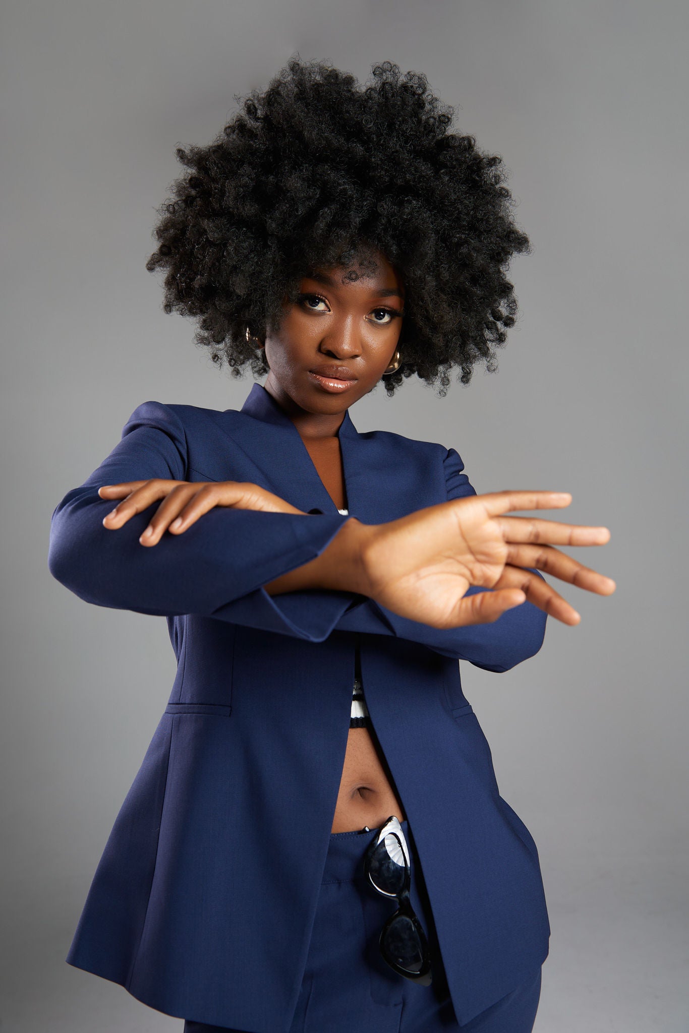 Seragyi's Nicole Blazer in Women's Suits, made from Italian Merino Wool. Features a cross-over collar and pyramid-cut sleeves, blending elegance and comfort in Women's Clothing.