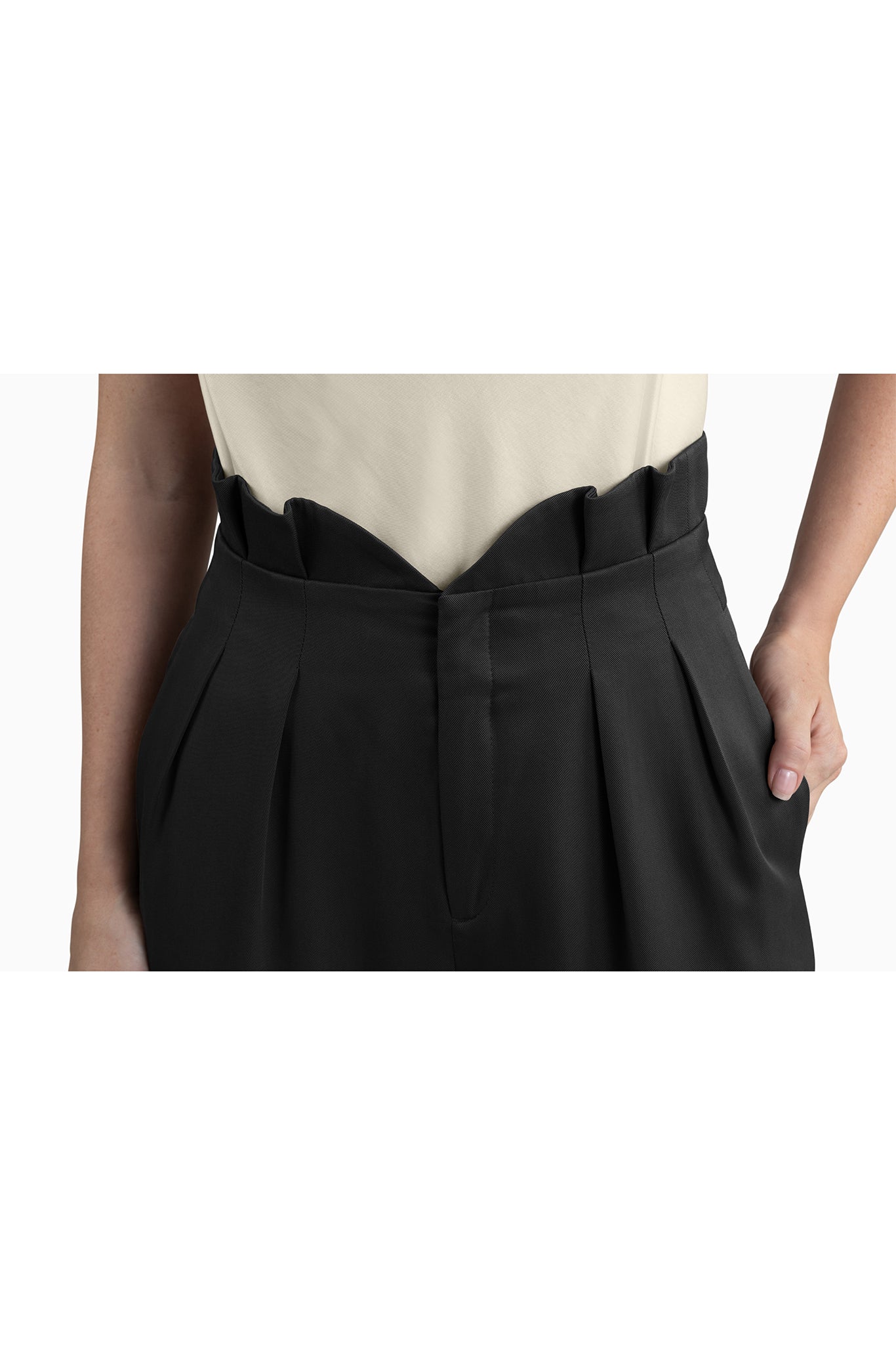 Seragyi Loulou tapered pleats pants, part of the Women's Suits collection, made from silky, eco-friendly lyocell twill. These Women's Suit Pants offer comfortable draping around the hips and thighs, with versatility to pair with blazers or casual tanks. A perfect addition to your Women's Clothing wardrobe.
