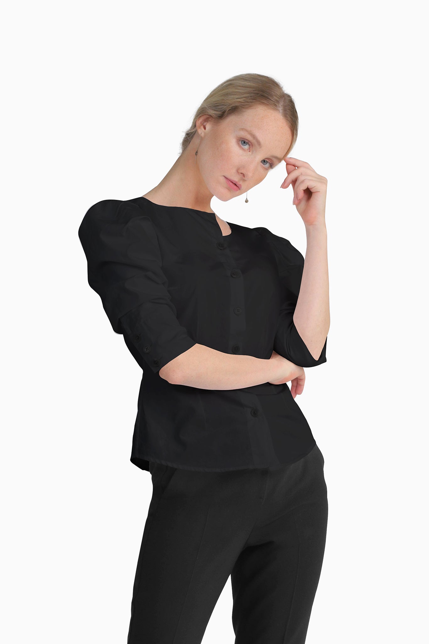 Seragyi's Martina Blouse in Black, made from sustainable cotton. With a modern asymmetrical neckline and ruched sleeves, this elegant design is a must-have in Women's Clothing.