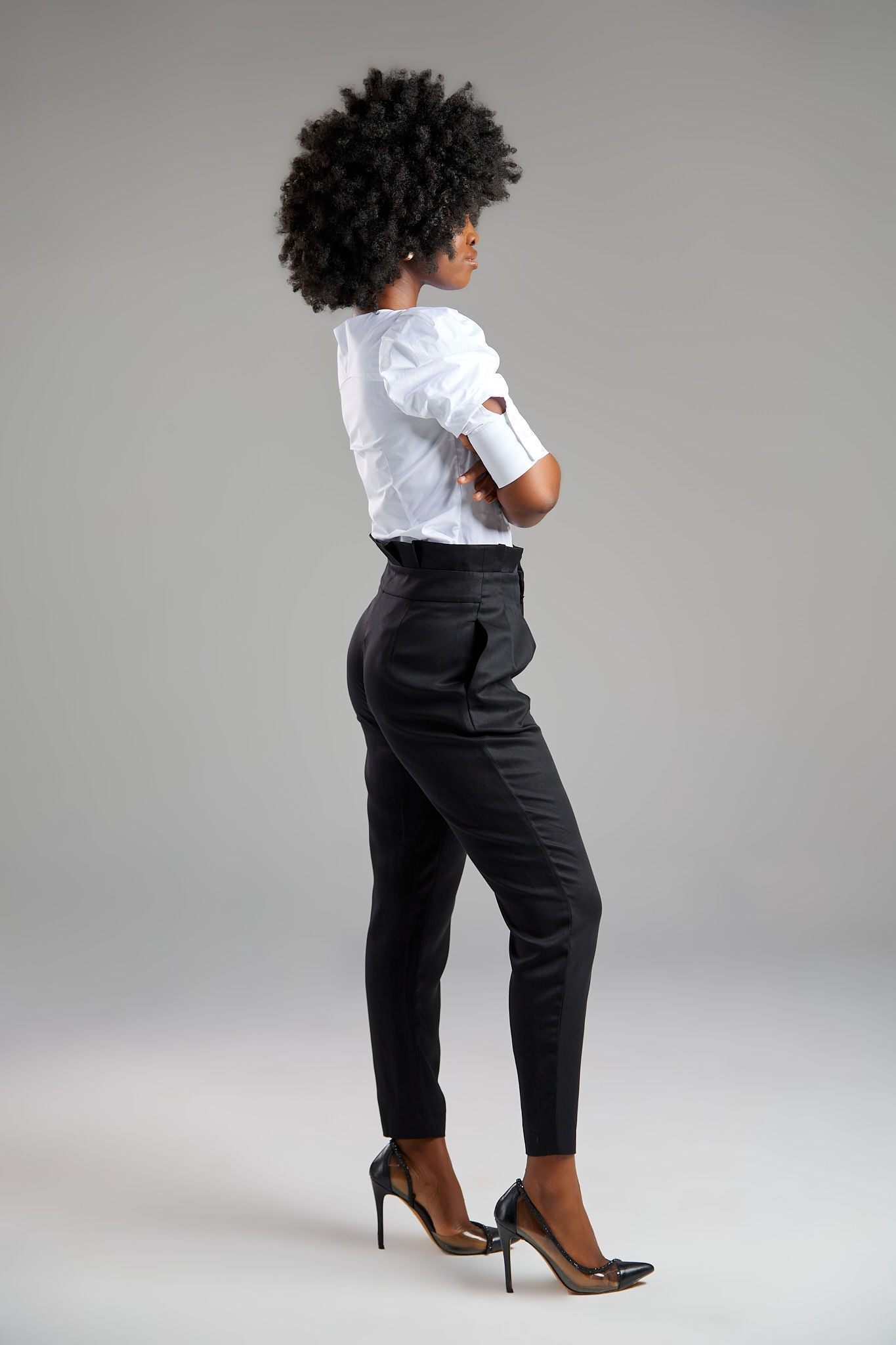 Seragyi Loulou tapered pleats pants, part of the Women's Suits collection, made from silky, eco-friendly lyocell twill. These Women's Suit Pants offer comfortable draping around the hips and thighs, with versatility to pair with blazers or casual tanks. A perfect addition to your Women's Clothing wardrobe.