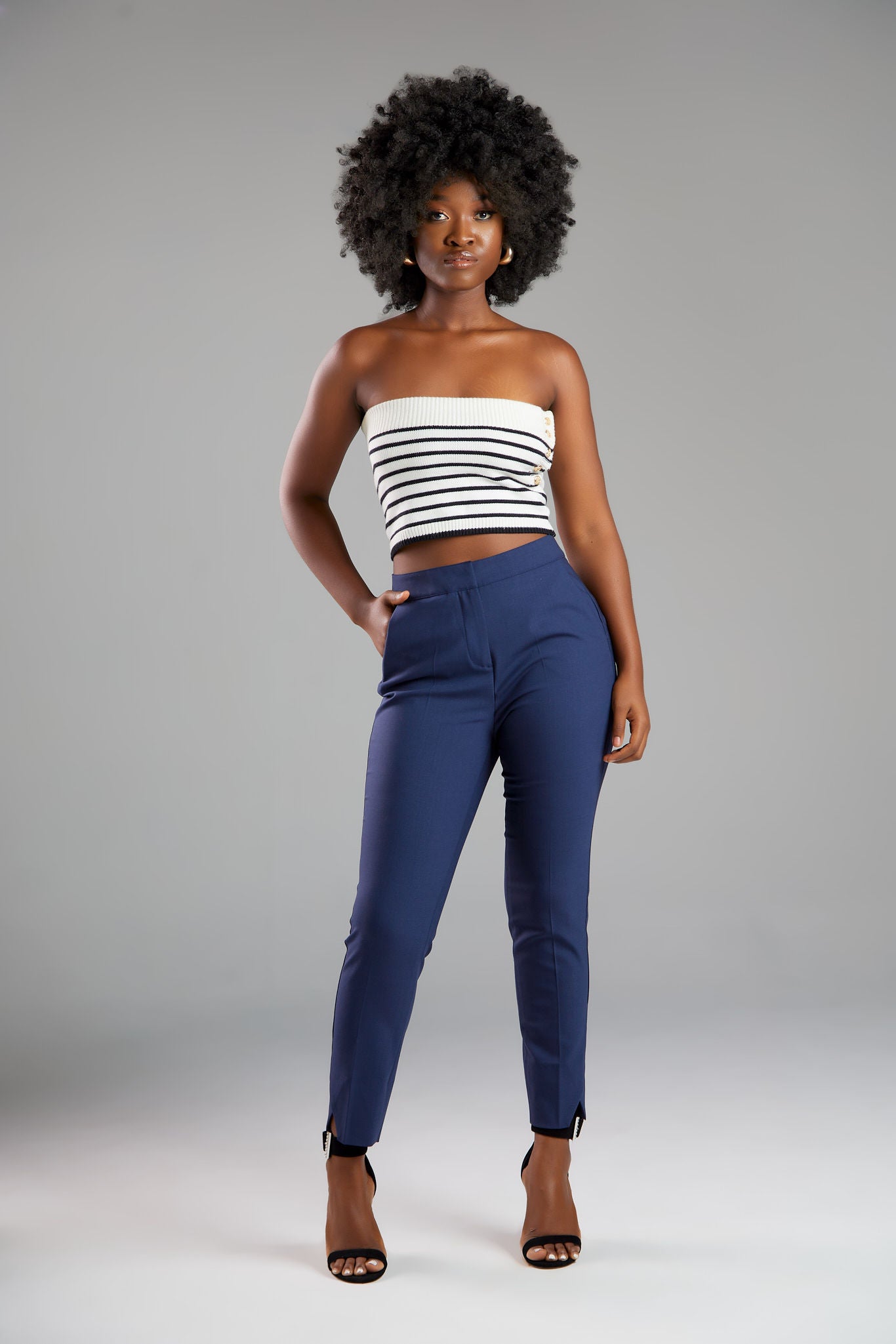 Women's pant suits with their distinctive ankle pyramid cut. Expertly crafted from Italian extra fine merino wool and elastane. Ideal for business meetings or casual wear.