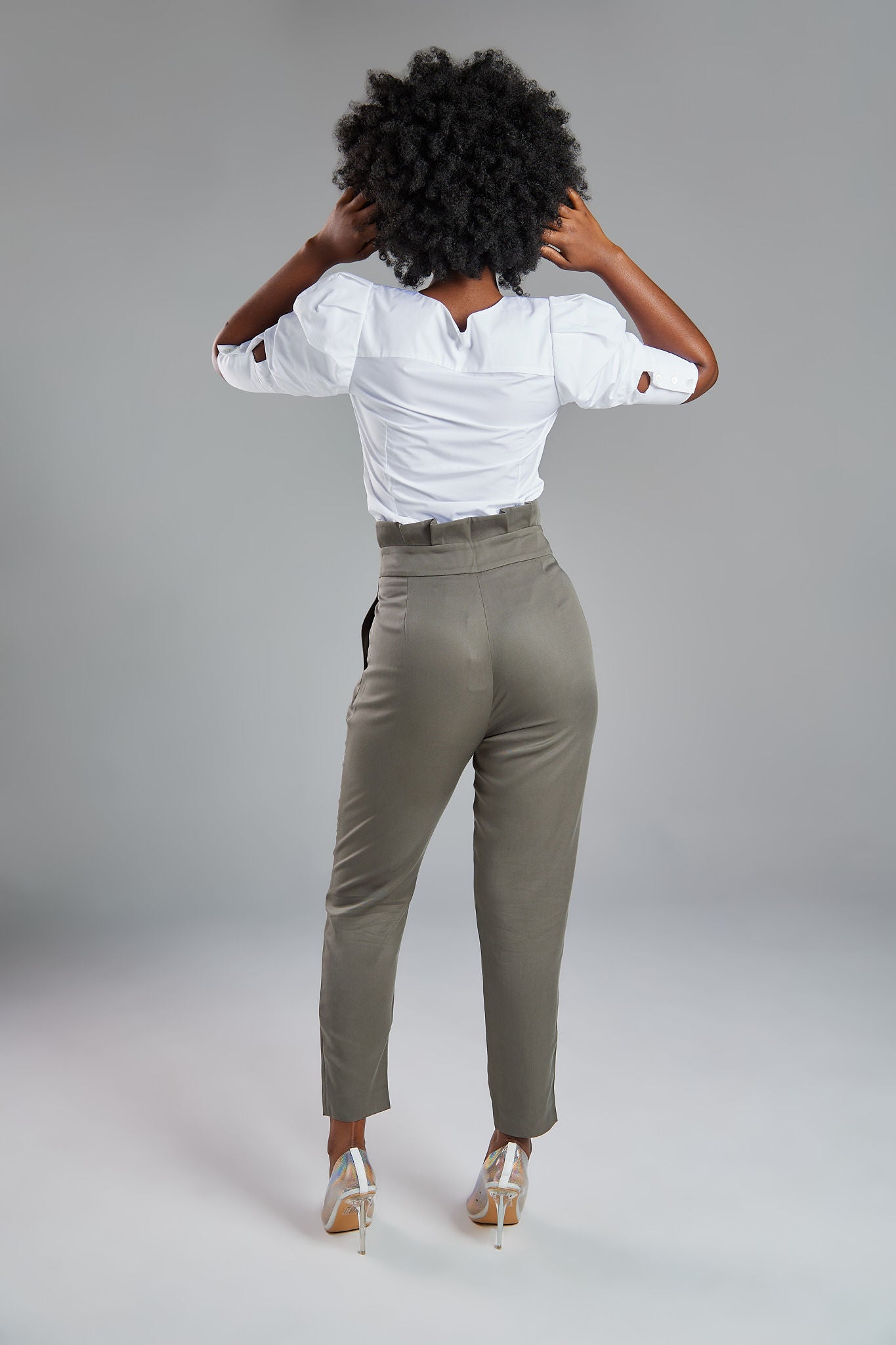 Seragyi Loulou tapered pleats pants, part of the Women's Suits collection, made from silky, eco-friendly lyocell twill. These Women's Suit Pants offer comfortable draping around the hips and thighs, with versatility to pair with blazers or casual tanks. A perfect addition to your Women's Clothing wardrobe.