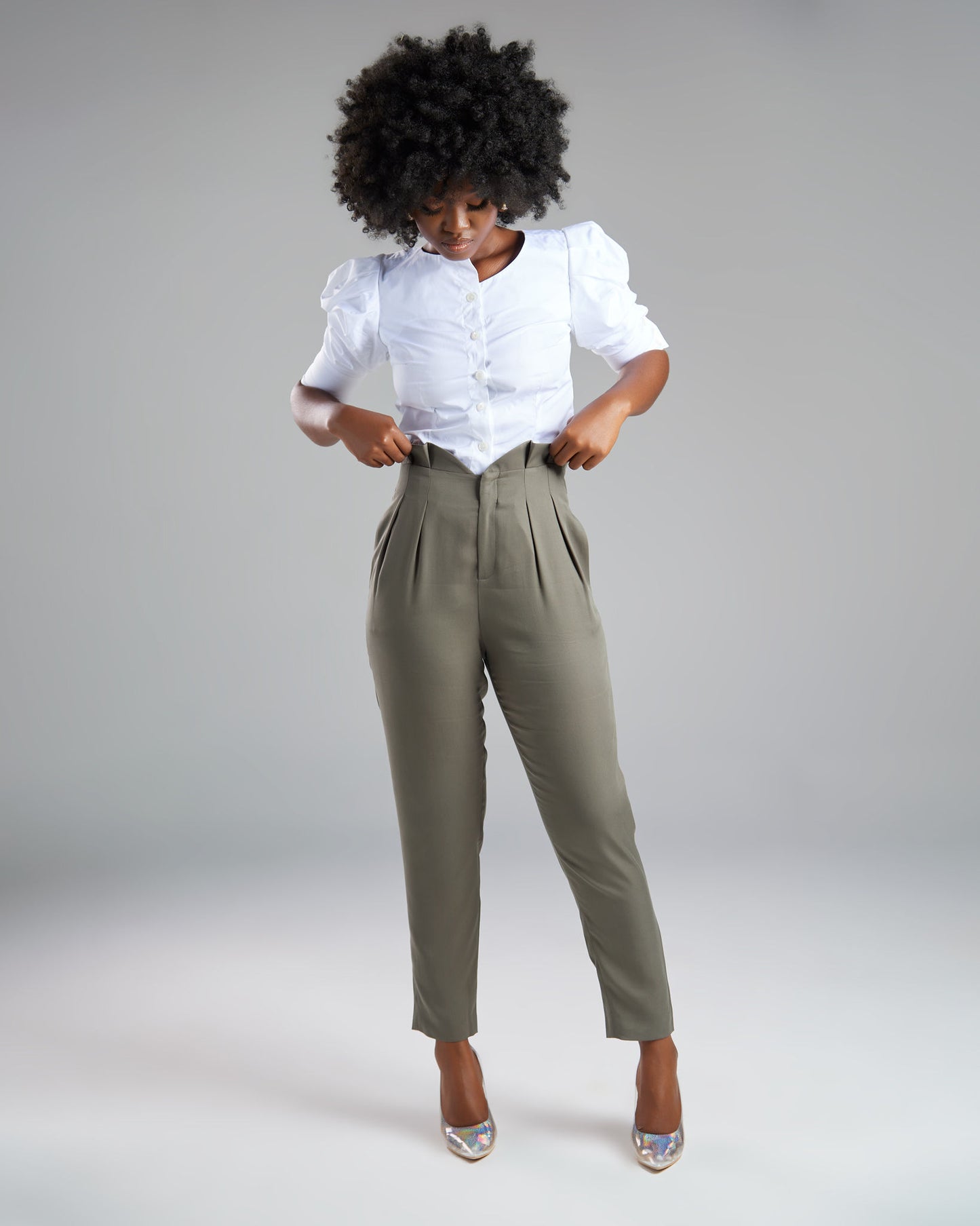 Seragyi Loulou tapered pleats pants, part of the Women's Suits collection, made from silky, eco-friendly lyocell twill. These Women's Suit Pants offer comfortable draping around the hips and thighs, with versatility to pair with blazers or casual tanks. A perfect addition to your Women's Clothing wardrobe.