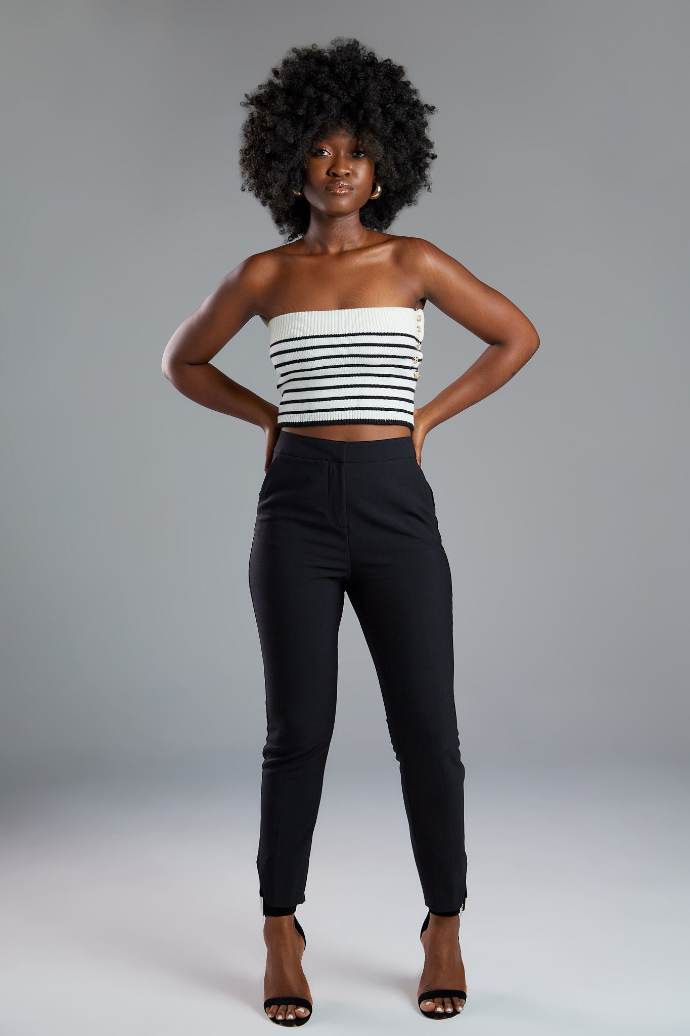 Women's pant suits with their distinctive ankle pyramid cut. Expertly crafted from Italian extra fine merino wool and elastane. Ideal for business meetings or casual wear.