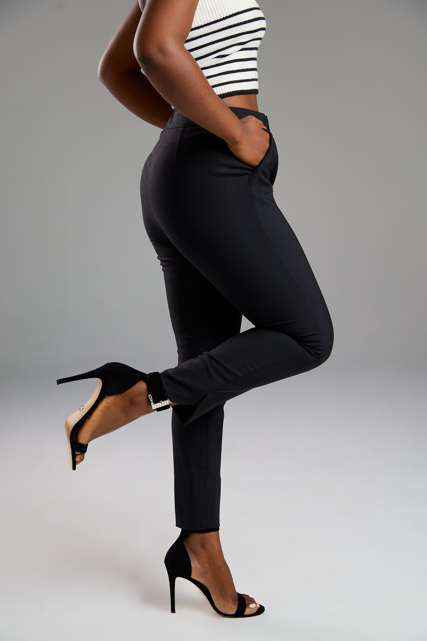 Women's pant suits with their distinctive ankle pyramid cut. Expertly crafted from Italian extra fine merino wool and elastane. Ideal for business meetings or casual wear.
