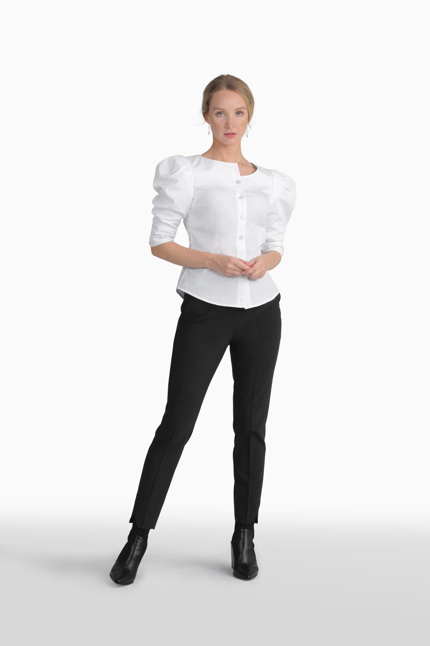 Seragyi's Martina Blouse in White, crafted from 100% eco-friendly cotton. Featuring an asymmetrical neckline and ruched sleeves, it's a versatile and elegant piece in Women's Clothing.